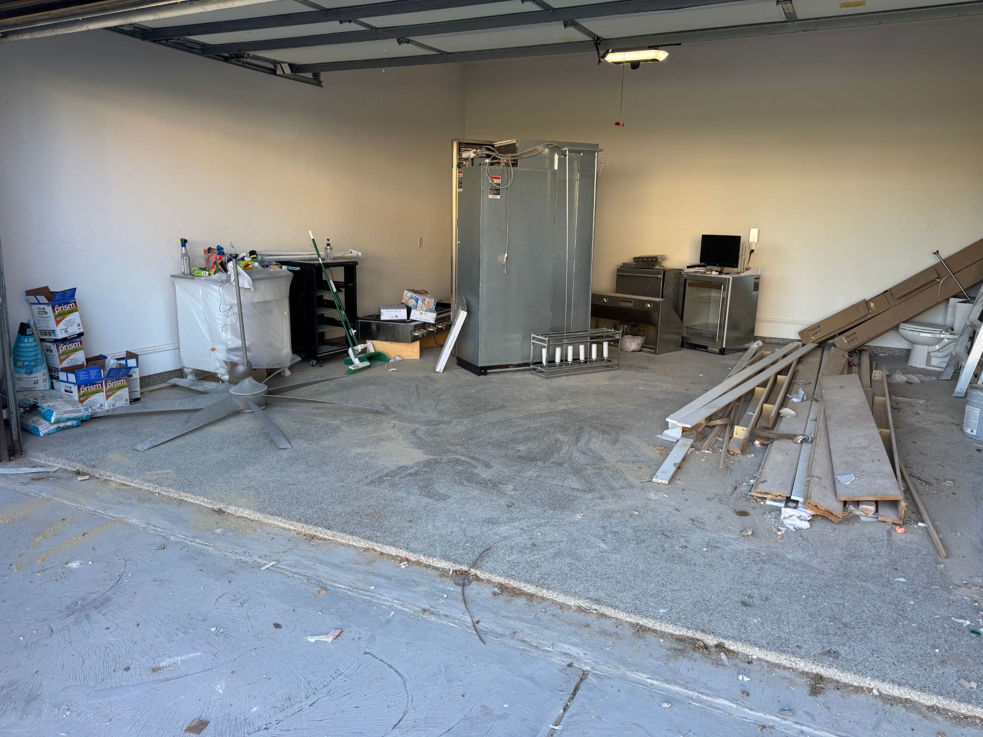 Garage cleared of debris after HAULR junk removal